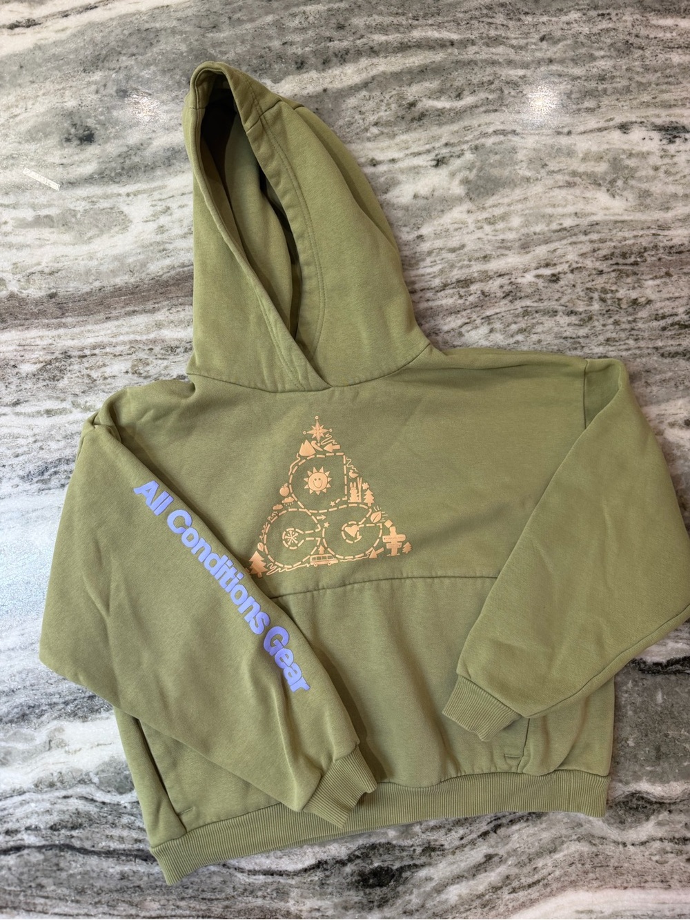 Nike ACG Olive Green Kids Hoodie with Peach Triangle Graphic